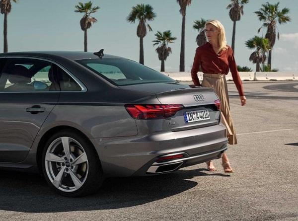 Grey Audi A4 Saloon parked on beach front