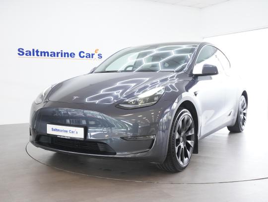 TESLA Model Y Photo 26cc04f1-8c3f-4a6a-ab7b-889e9c539497.jpg