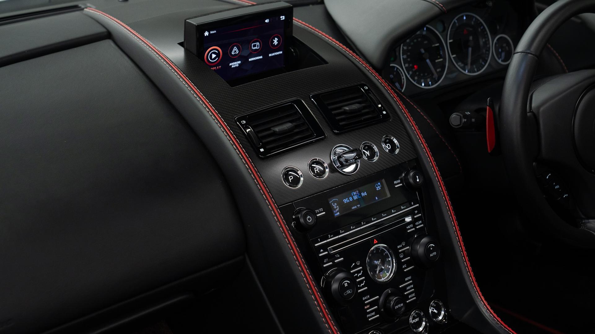 Aston Martin DB9 Photo 536cf6c2-3c47-4bcc-86a4-957d90b0af84.jpg