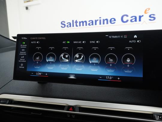 BMW iX Photo a6f7a5b1-35c4-454e-a7f8-f44e6e474d72.jpg