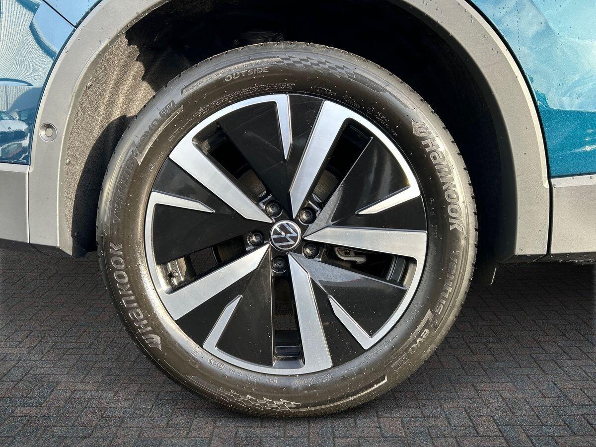 Volkswagen Tiguan Photo at-00996a0d18de4cbc98f6205cf673f8ae.jpg