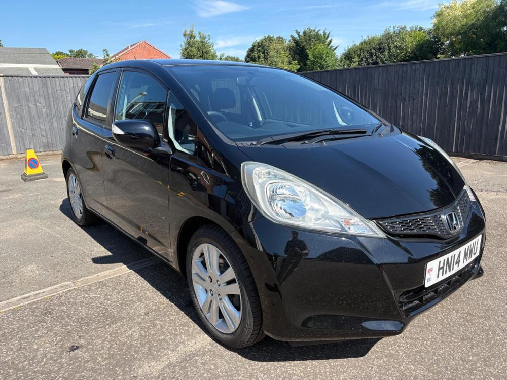 Honda Jazz Photo at-03c6ddb8cad444da87750e7e74734b84.jpg