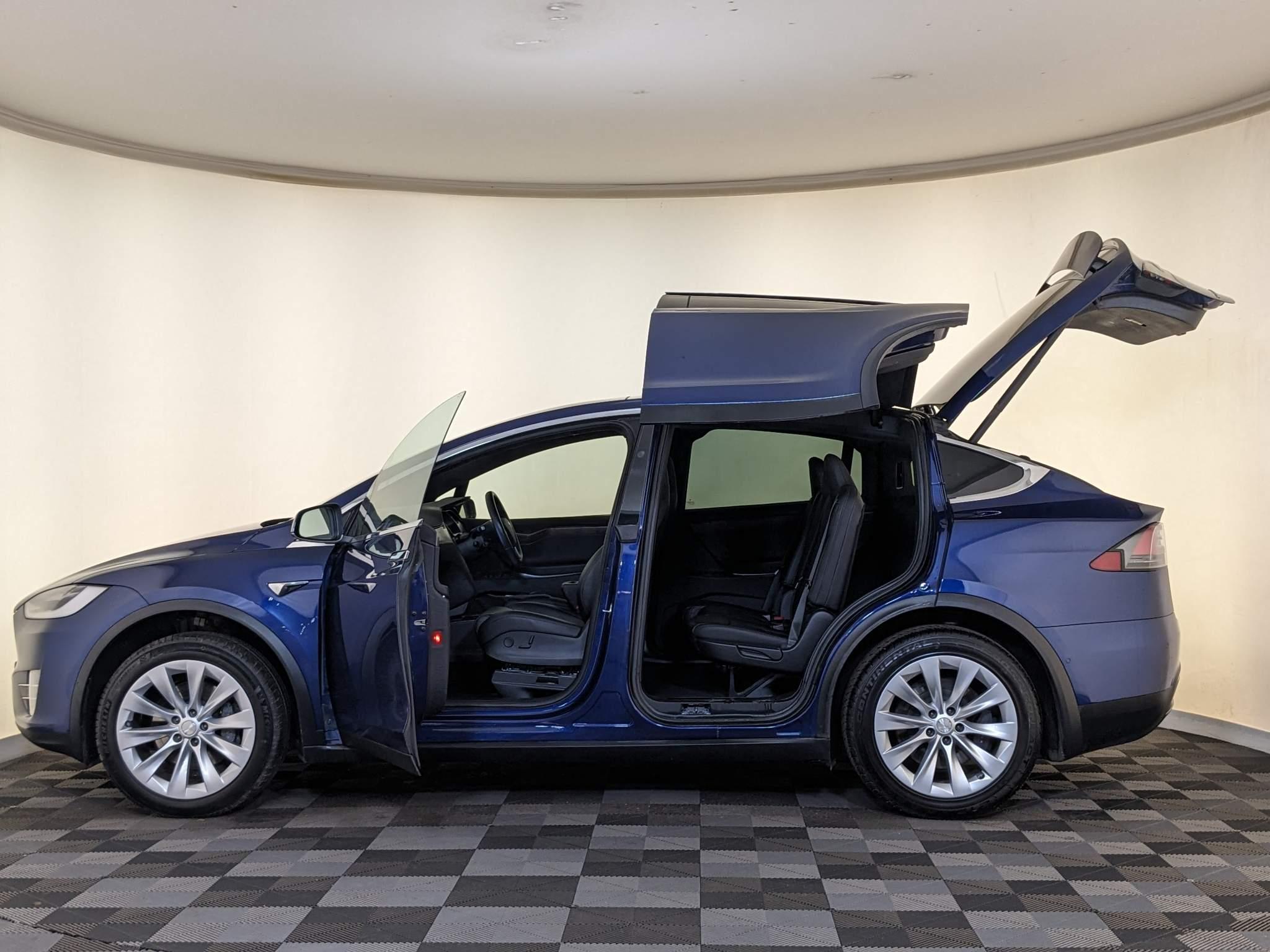 Tesla model x blue deals with white interior