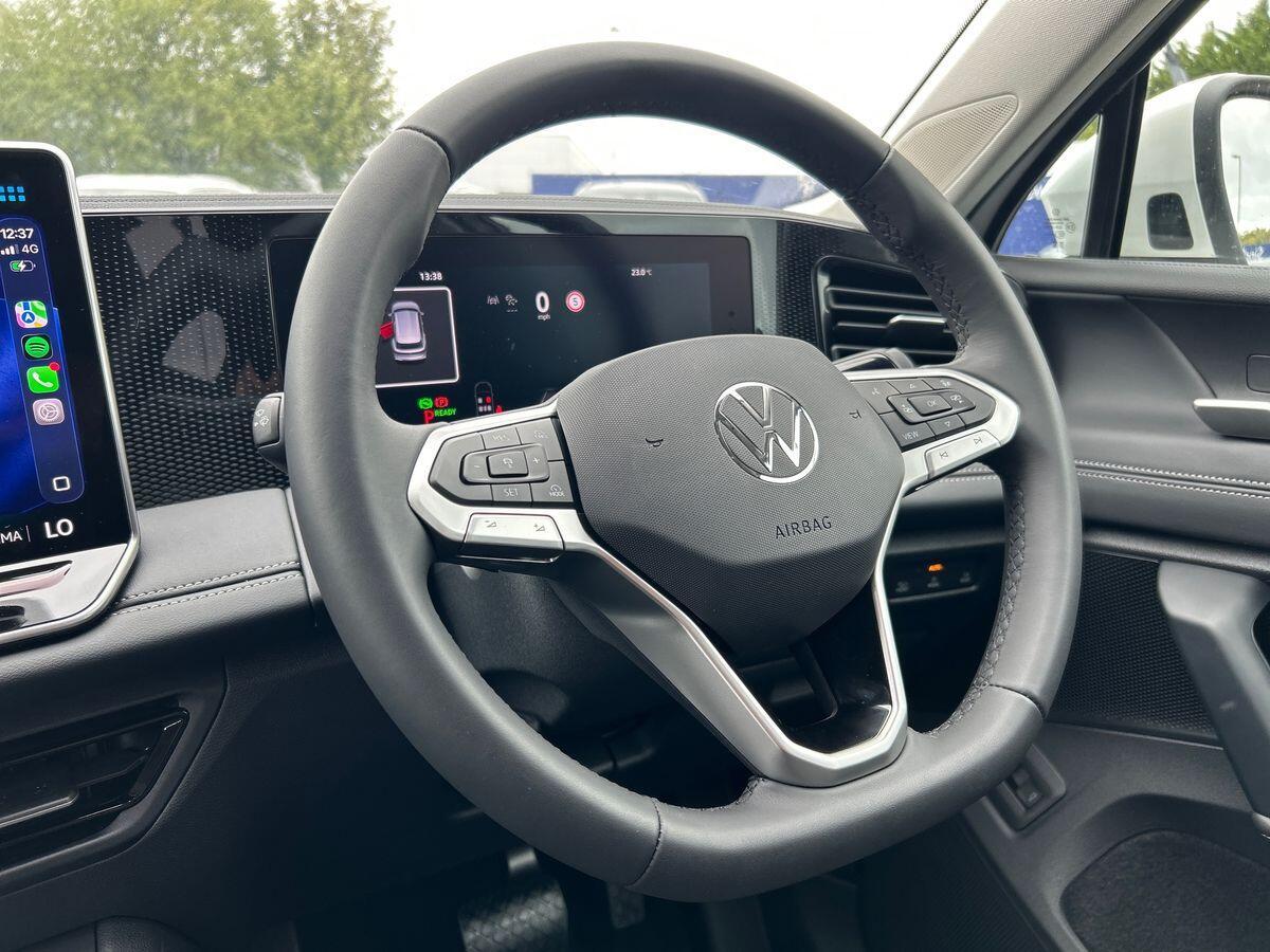 Volkswagen Tiguan Photo at-1233e6bcf8664ee4b83d1920ecef973c.jpg