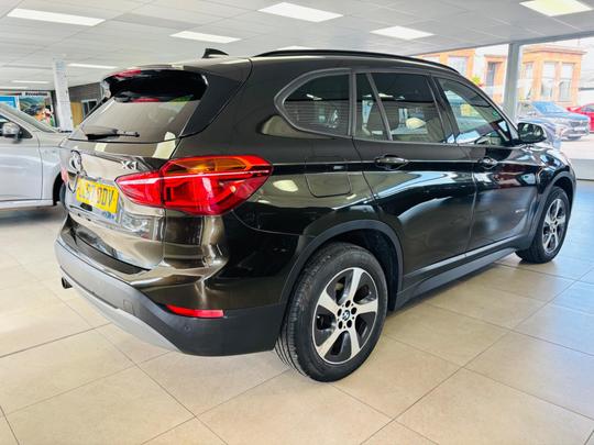 BMW X1 Photo at-1ab6624feacb4d8fbbb41ab3335c7d1a.jpg
