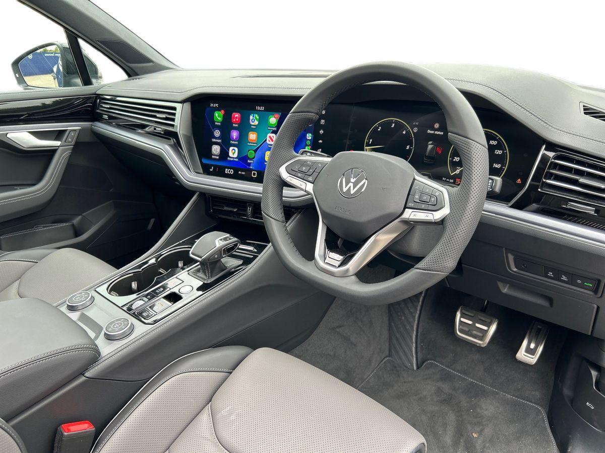 Volkswagen Touareg Photo at-1ac9f64728484aaca3c393e6fbccbf22.jpg