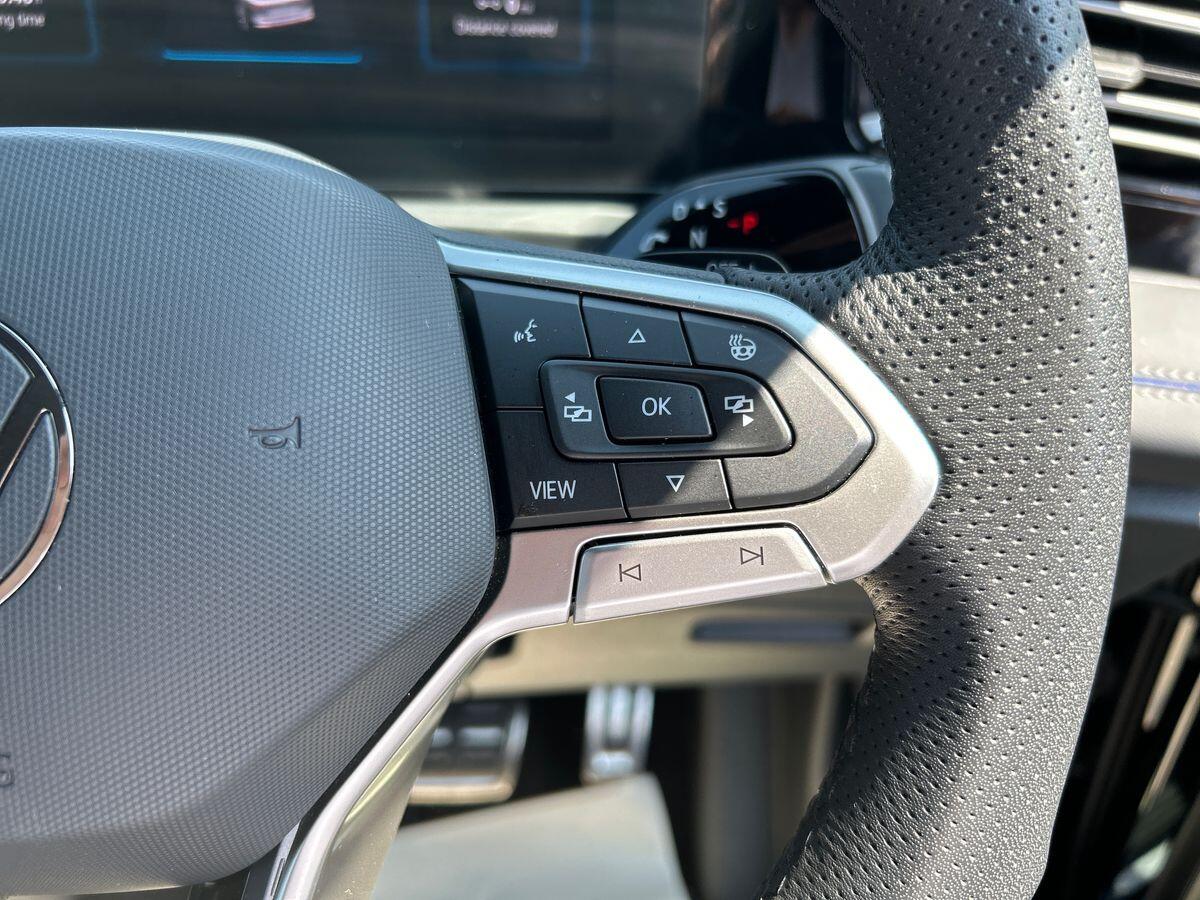 Volkswagen Tiguan Photo at-238708314b344fee980c6e700baf3e1e.jpg