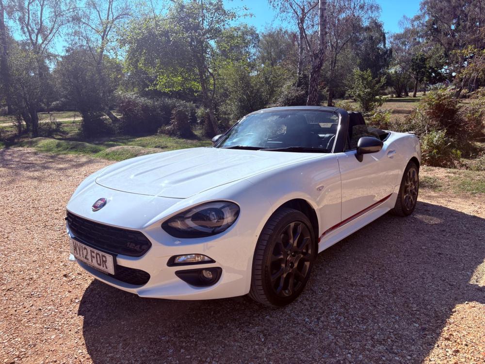 Fiat 124 Spider Photo at-2cc039177c6a4183bf7a90d232e06f33.jpg