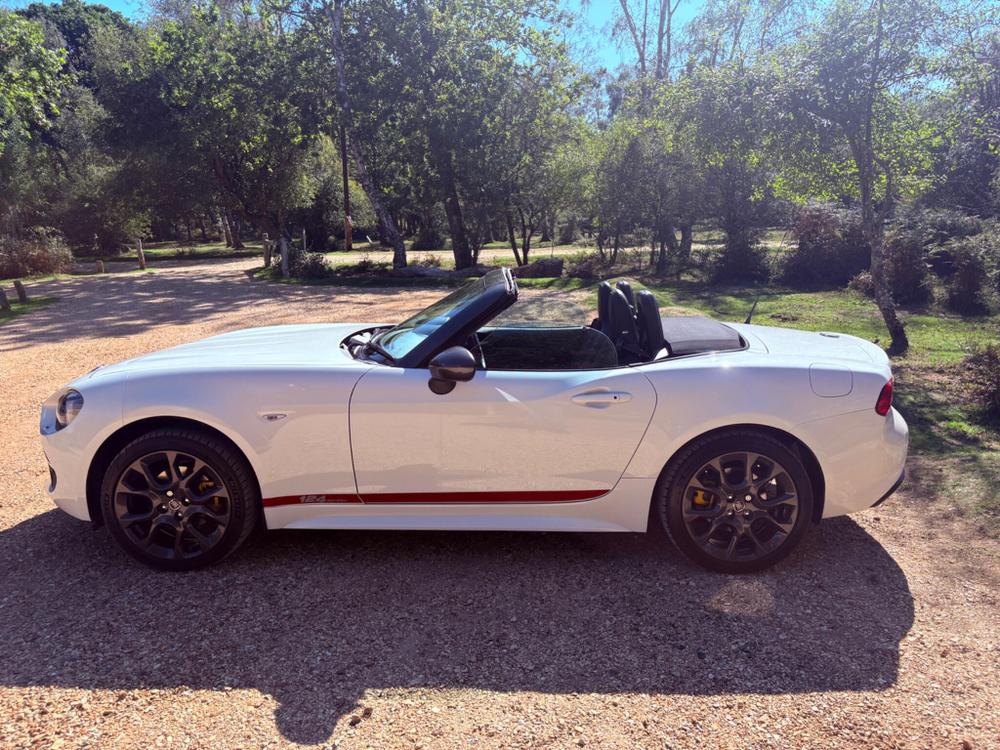 Fiat 124 Spider Photo at-2e6b170425c84bfeb70df49597fb47e8.jpg