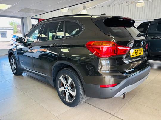 BMW X1 Photo at-30aa78705e2b402b8edc3cbb83f5e242.jpg