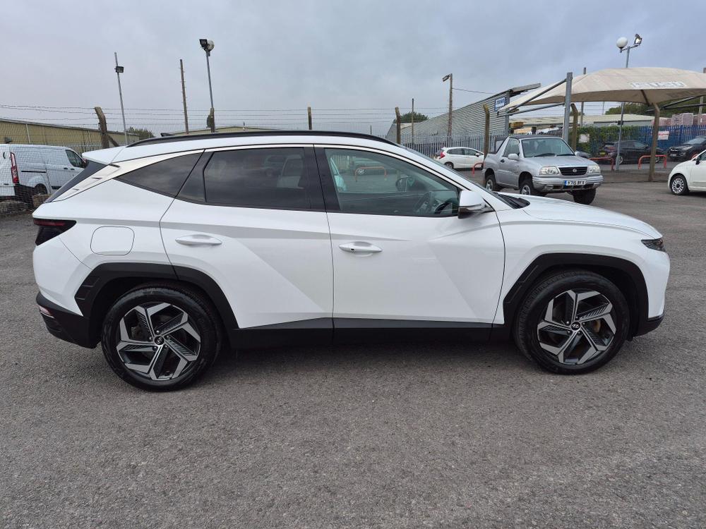 Hyundai TUCSON Photo at-3a996c565c24463b85e982665fd3368e.jpg