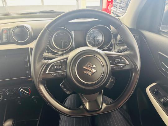 Suzuki Swift Photo at-58f93cf089ae4b06bf42ca14809ce702.jpg