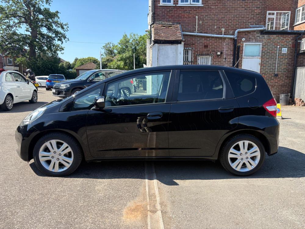 Honda Jazz Photo at-59044edabff94cafa9ed42b87dd488ba.jpg