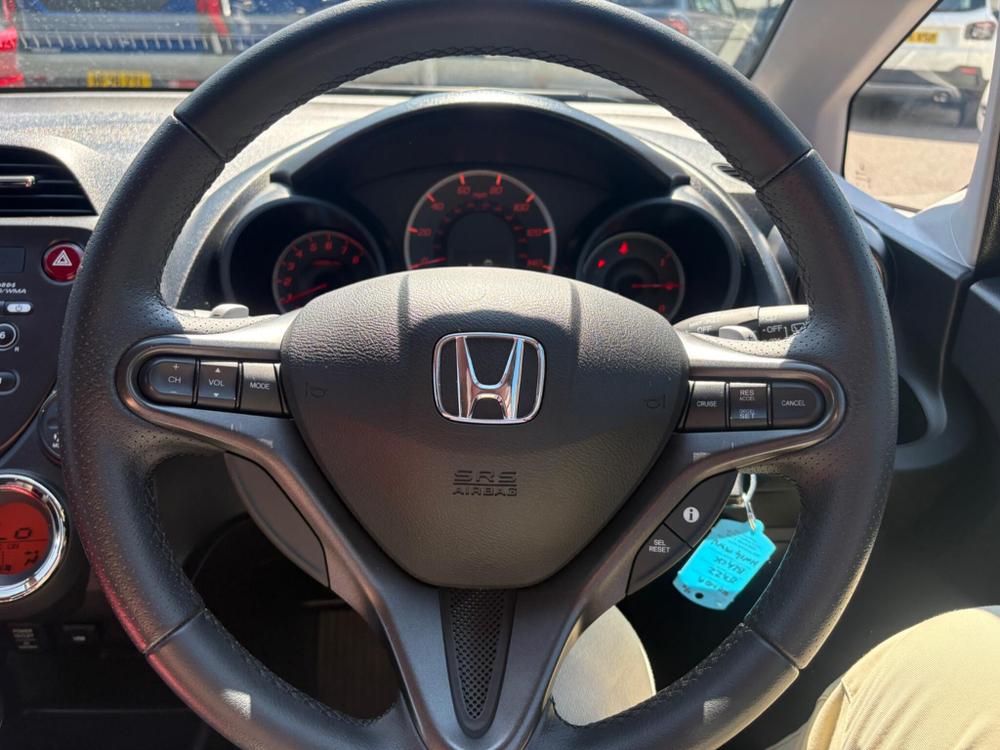 Honda Jazz Photo at-5d130bd052344d65a82de950e492b27e.jpg