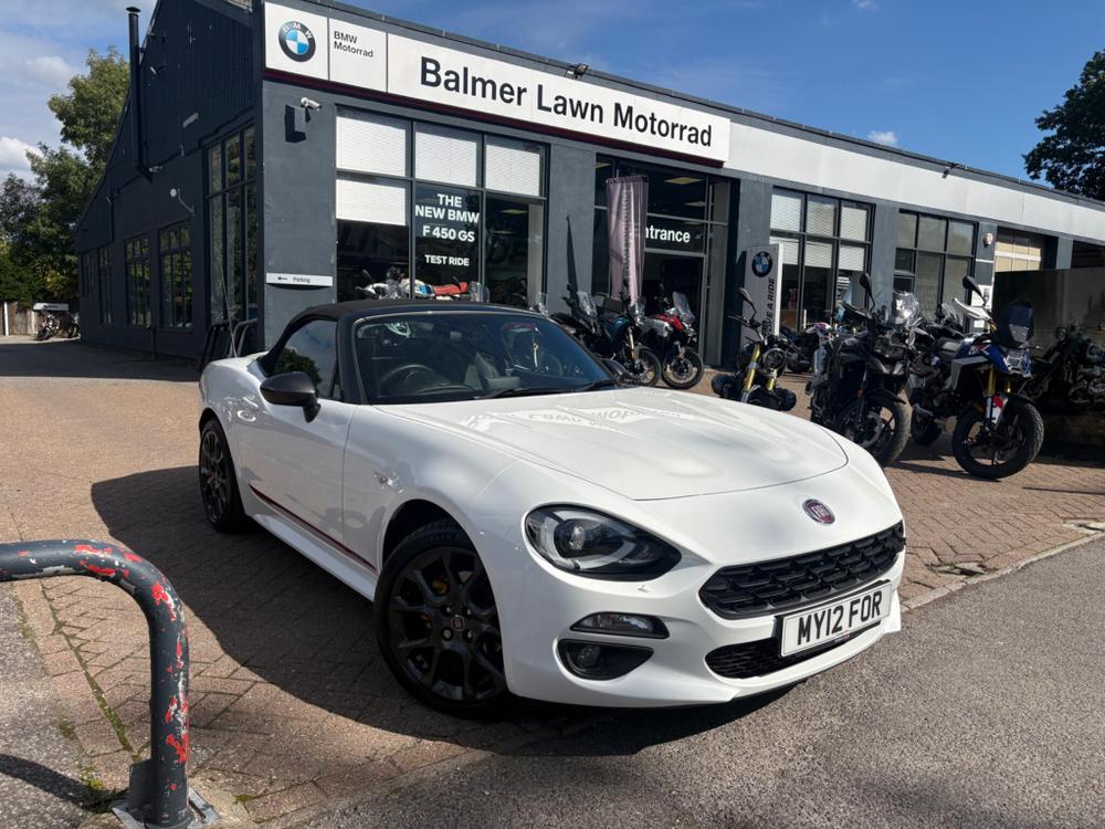 Fiat 124 Spider Photo at-658d4fe119ef49128b6f09bcc4b36439.jpg