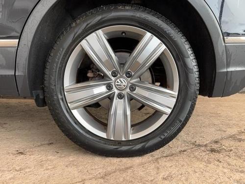 Volkswagen TIGUAN Photo at-7ab01c5a30ce41da997807eebd2d4ef7.jpg