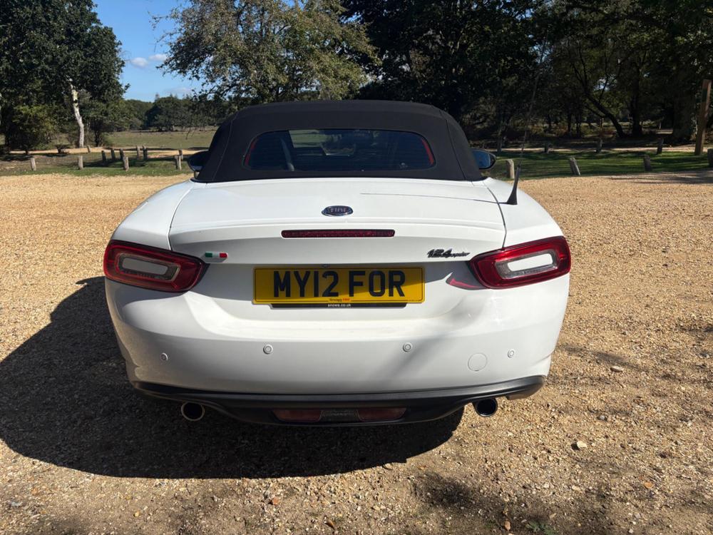Fiat 124 Spider Photo at-93ad394423394d54af43a6726cf136a4.jpg