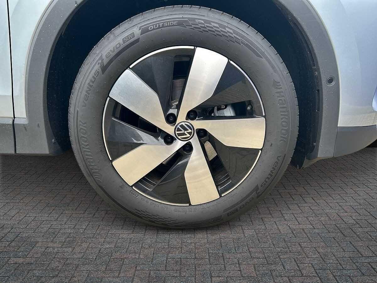 Volkswagen Tiguan Photo at-a08fd9f94a6748f88660063616f59e9e.jpg