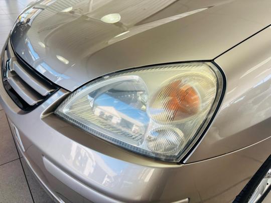 Suzuki Liana Photo at-a524160d7a5f4ffb91f9eb527b3b8b93.jpg