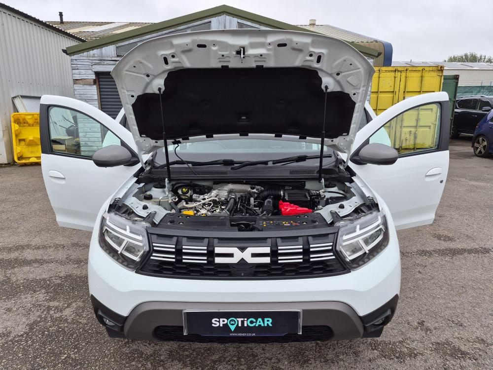 Dacia Duster Photo at-a6c90358d5664c35b98f0afcb8ea150c.jpg