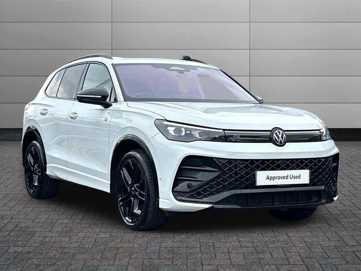 Volkswagen Tiguan Photo at-a81657be2e9e47b0b42660465a1a5105.jpg