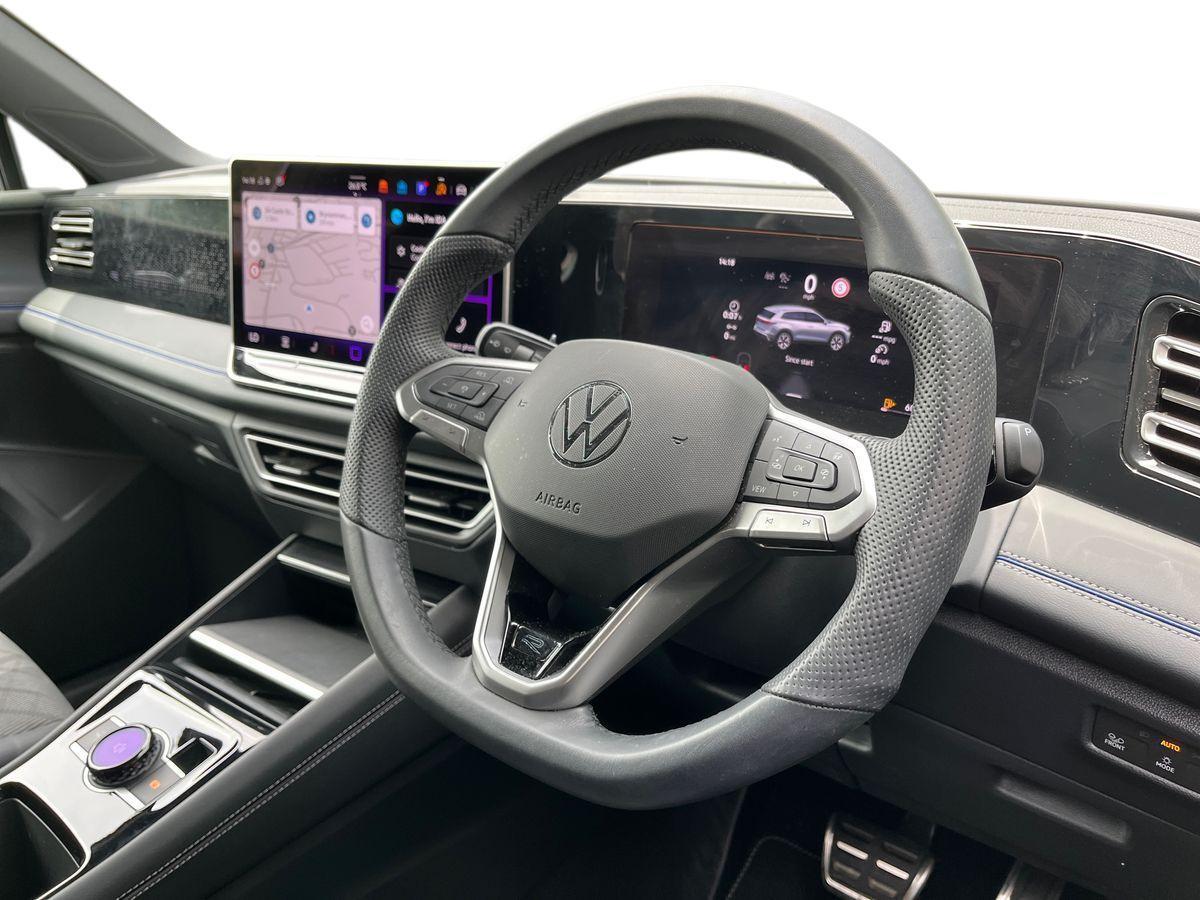 Volkswagen Tiguan Photo at-a98de0d1c5bf4d3fa16811678a58f555.jpg