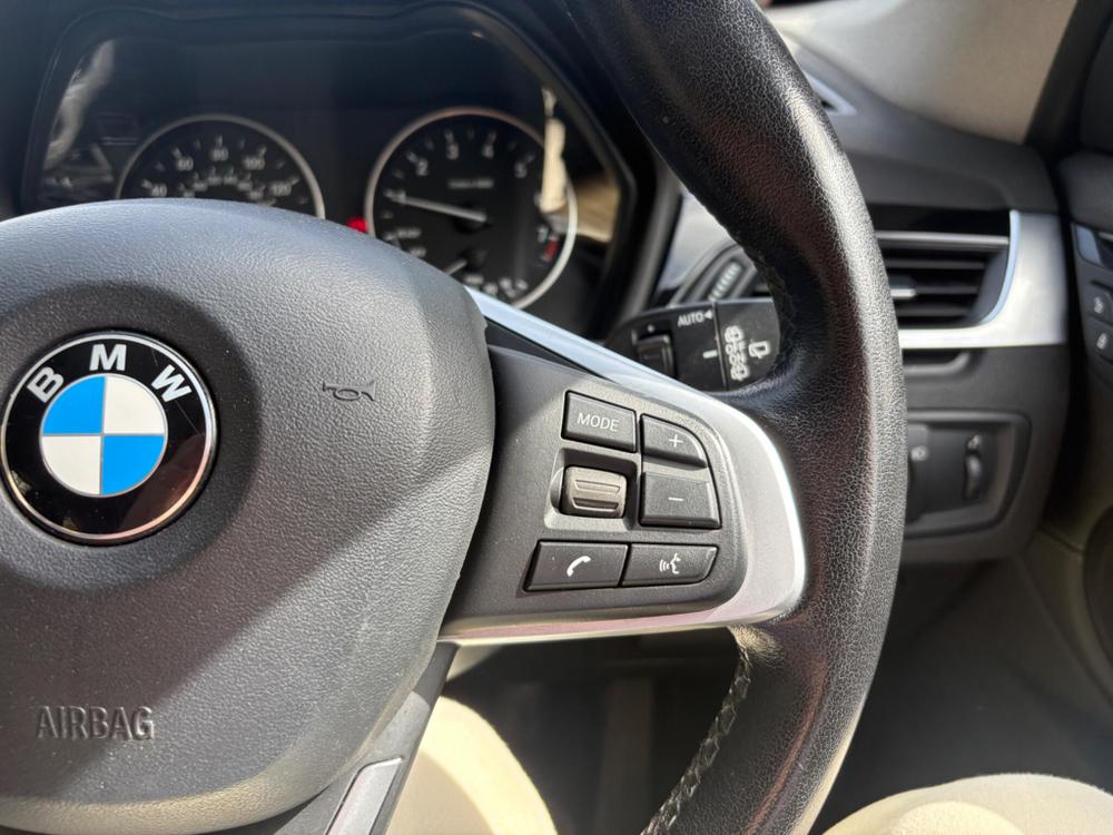 BMW X1 Photo at-af7d18ae27b7440aacff52faf8ad121f.jpg