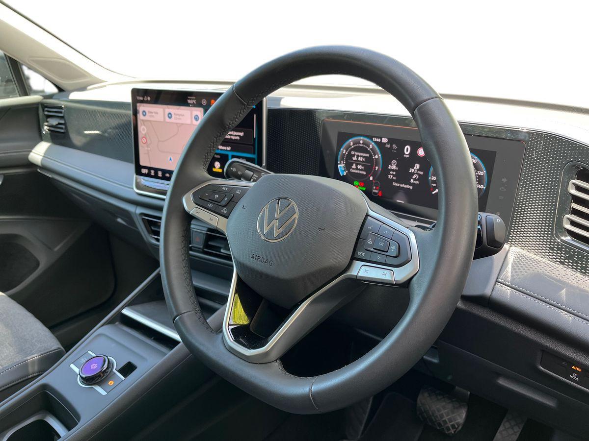 Volkswagen Tiguan Photo at-b9ce471a87e64673848b49e67c7f0476.jpg
