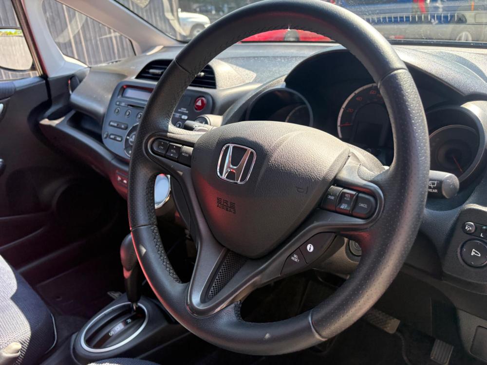 Honda Jazz Photo at-bf5c98ad2a2b488087edcffbde197f74.jpg