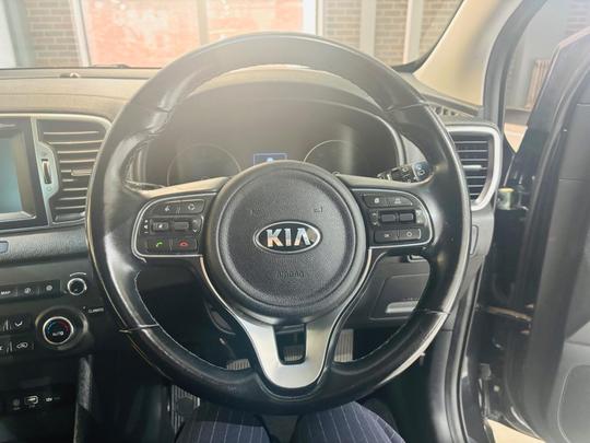 Kia Sportage Photo at-c1cfe2da81e845fea4f7963c6b46ada2.jpg