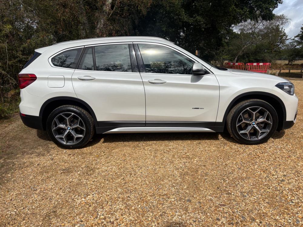 BMW X1 Photo at-c3b1938cc513481eb42cfba09fdea5f8.jpg
