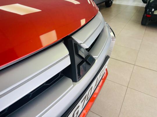Mitsubishi L200 Photo at-d5b2345052fd4a1497da7dd2d497fd13.jpg