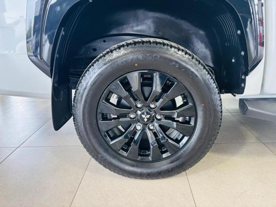 Mitsubishi L200 Photo at-d8b32c2cb4bd4fff9ac0f8136eafb376.jpg