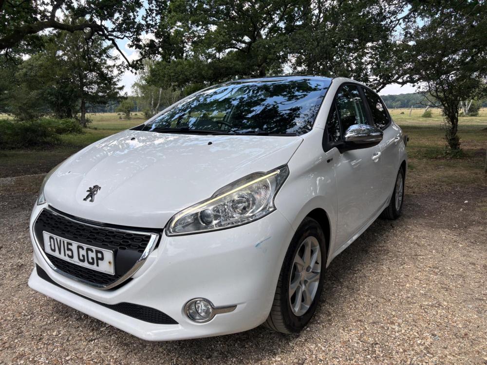 Peugeot 208 Photo at-dffb9a3e35f34cec923987e0a613afa2.jpg