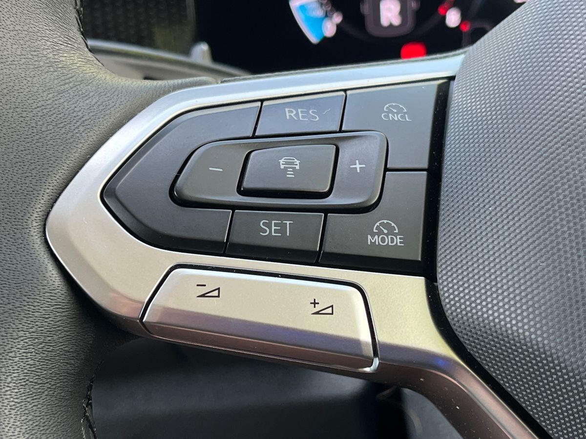 Volkswagen Tiguan Photo at-e100049a79b84516b0c2902cb901a626.jpg