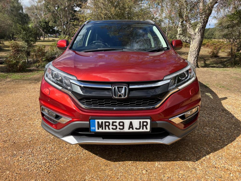 Honda CR-V Photo at-e6c26755e5064ebd8c1ab001f97fa8e4.jpg