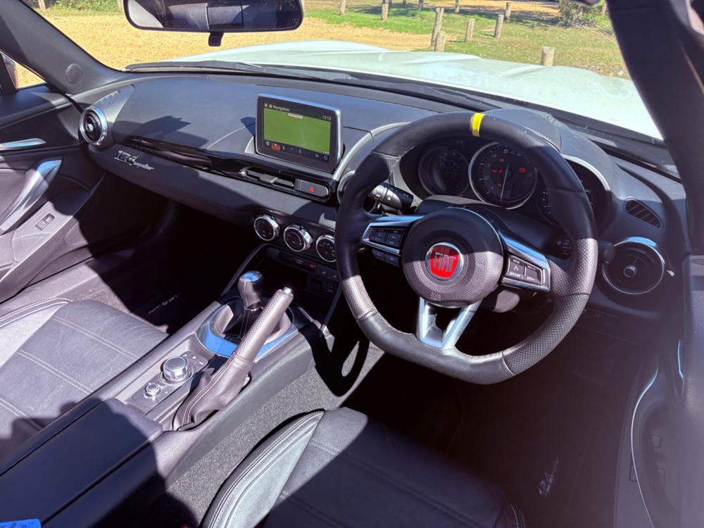 Fiat 124 Spider Photo at-fbec6e249df04bc7b5a773d9ac92b149.jpg