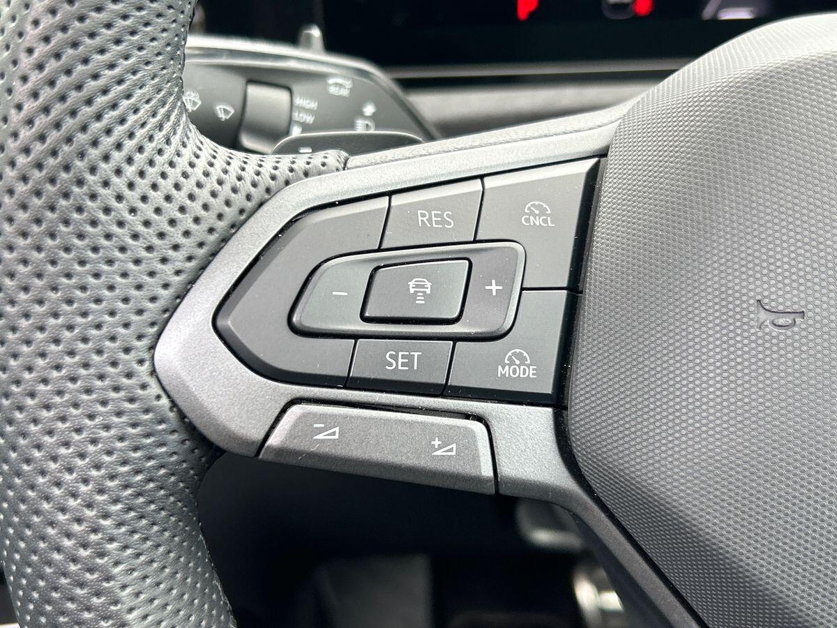 Volkswagen Tiguan Photo at-fe233318e3cb40a1bde1c909a03c4c10.jpg