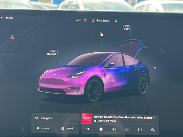 TESLA Model Y Photo autoimg-8a476f95b82c41ffe70fa3a6710a0d32edfd71f6.jpg