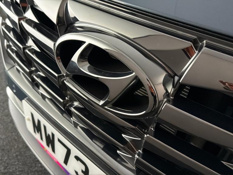 HYUNDAI TUCSON Photo bsapi-4e8394c6b5568dd85a8a782e5245ffe6e2b61988.jpg