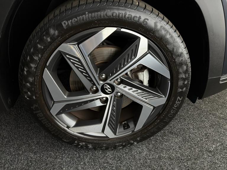 HYUNDAI Tucson Photo bsapi-be463814ab57f52dbd711e343bf425e693c830fa.jpg