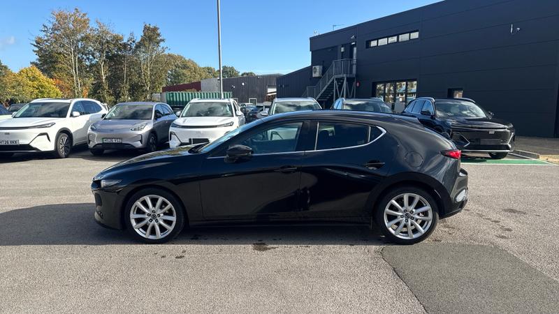 Mazda Mazda3 Photo cohere-ddaf68a905c61de33e691d9b88821859795773c1.jpg