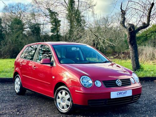 2004 POLO 1.2 TWIST METALLIC RED LOW MILEAGE PETROL MANUAL ULEZ PETROL 93,000 MILES... photo