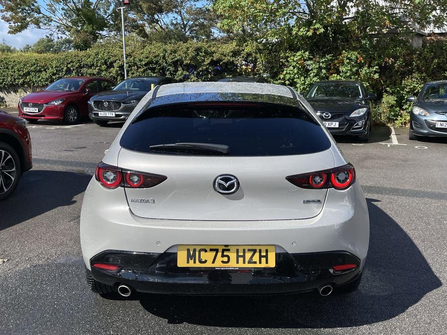 Mazda Mazda3 Photo spincar-4a55f1a53c8da3686396bb36bd1aad6feffd2516.jpg